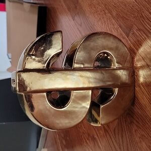 Dollar sign $ piggy bank